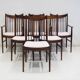 Set of six wooden dining chairs Arne Vodder Model No 422 with fabric upholstery.