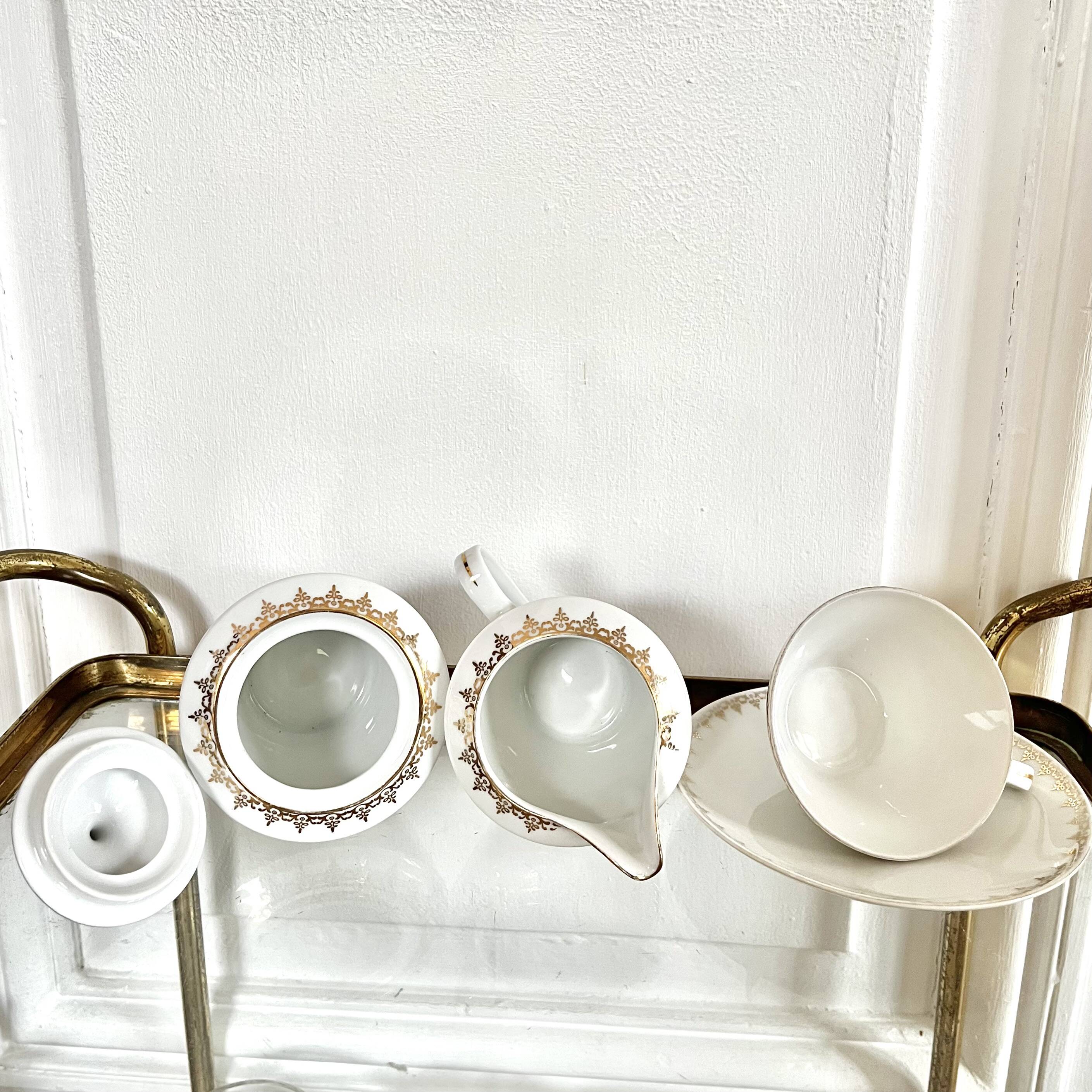 Porcelain sugar bowl and milk jug