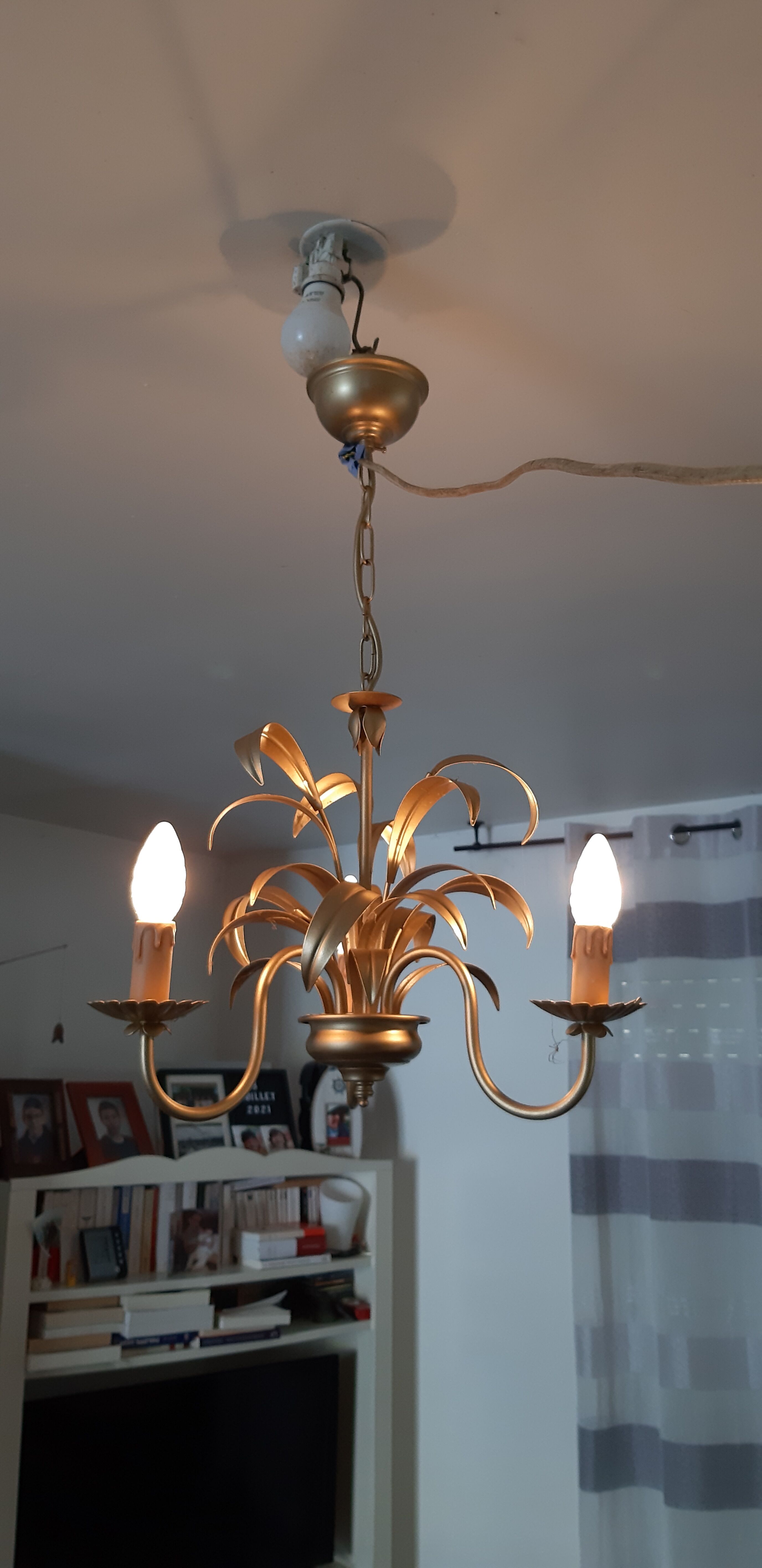 Vintage chandelier in golden metal