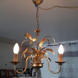 Vintage chandelier in golden metal
