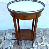 Four-legged oval gueridon with crotch or side table