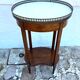 Four-legged oval gueridon with crotch or side table
