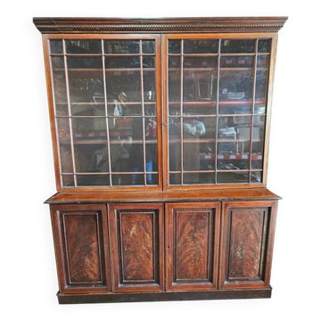 English library in mahogany with drawers