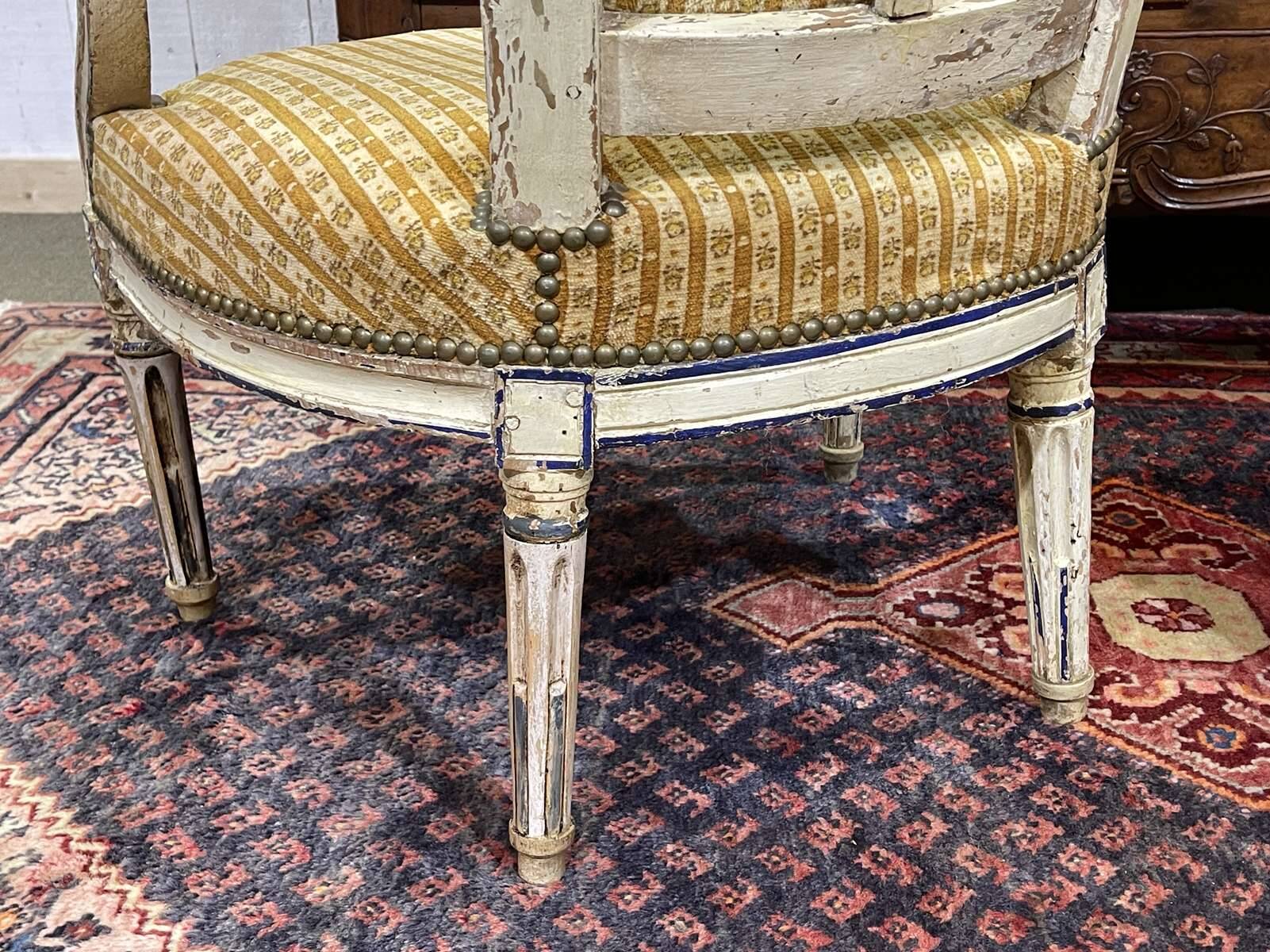 Pair of Louis XVI period cabriolet chairs in beech.