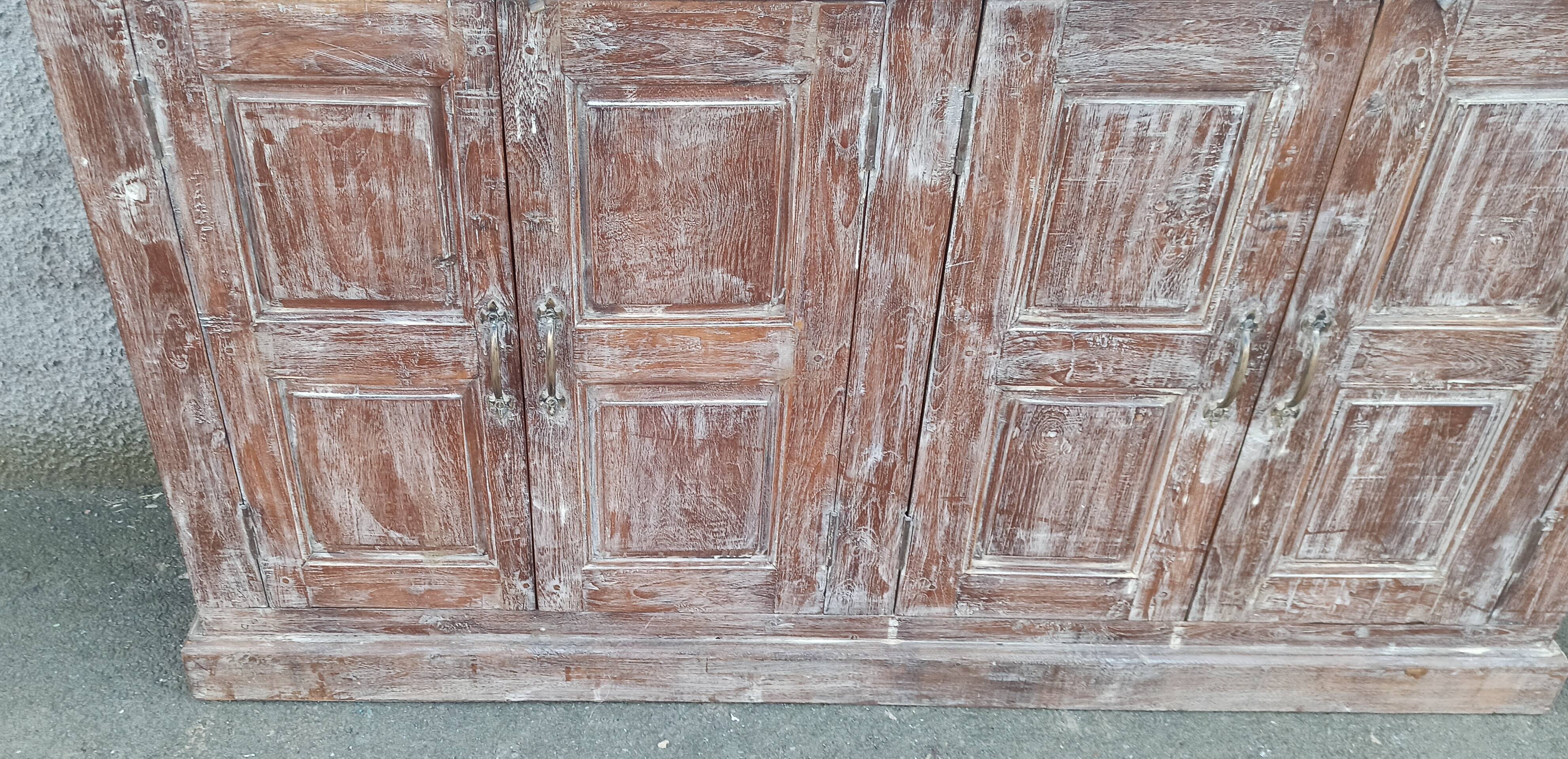 Old wooden sideboard with 4 doors