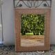 Vintage rattan and wrought iron mirror
