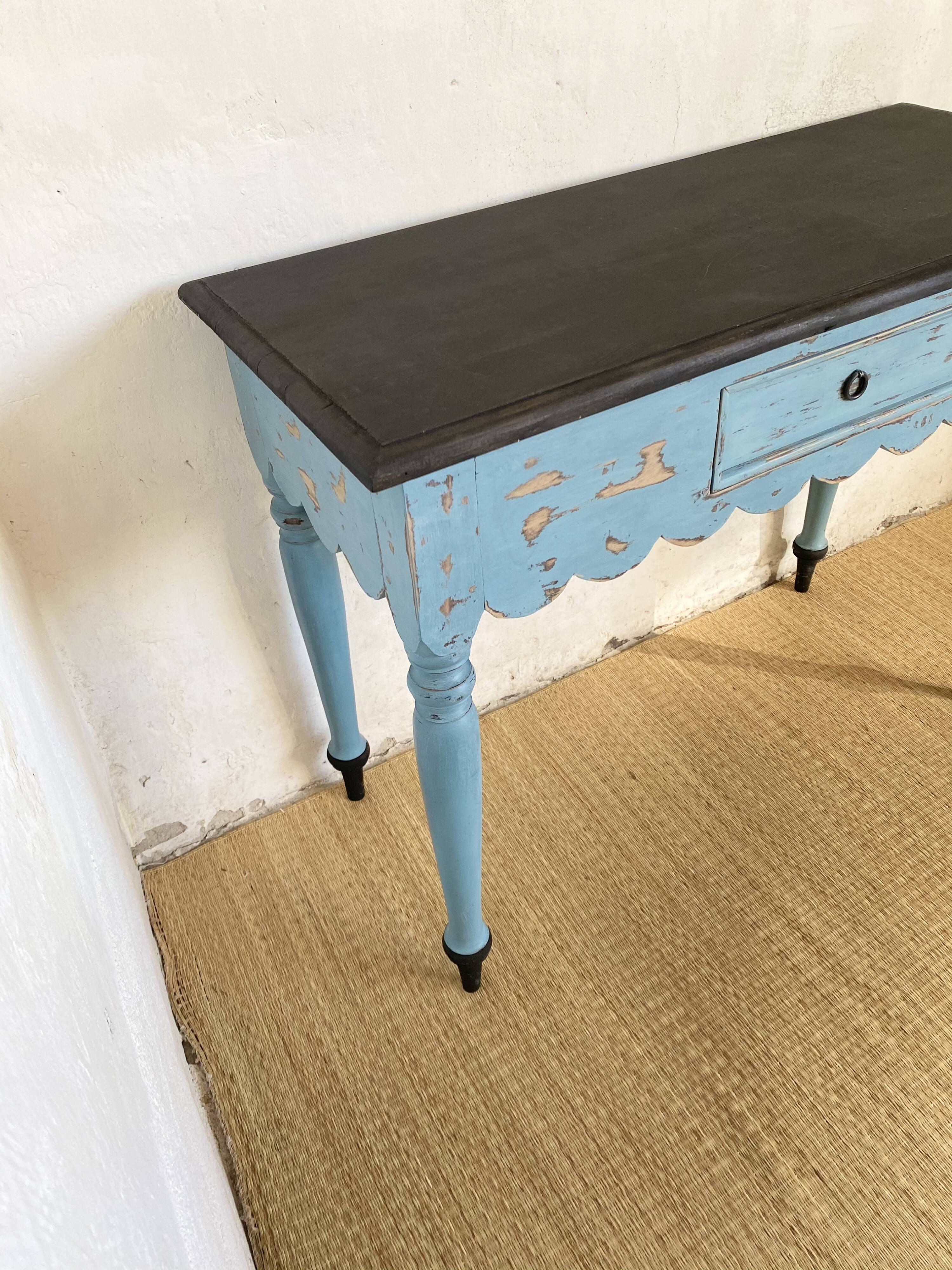 Scalloped console table