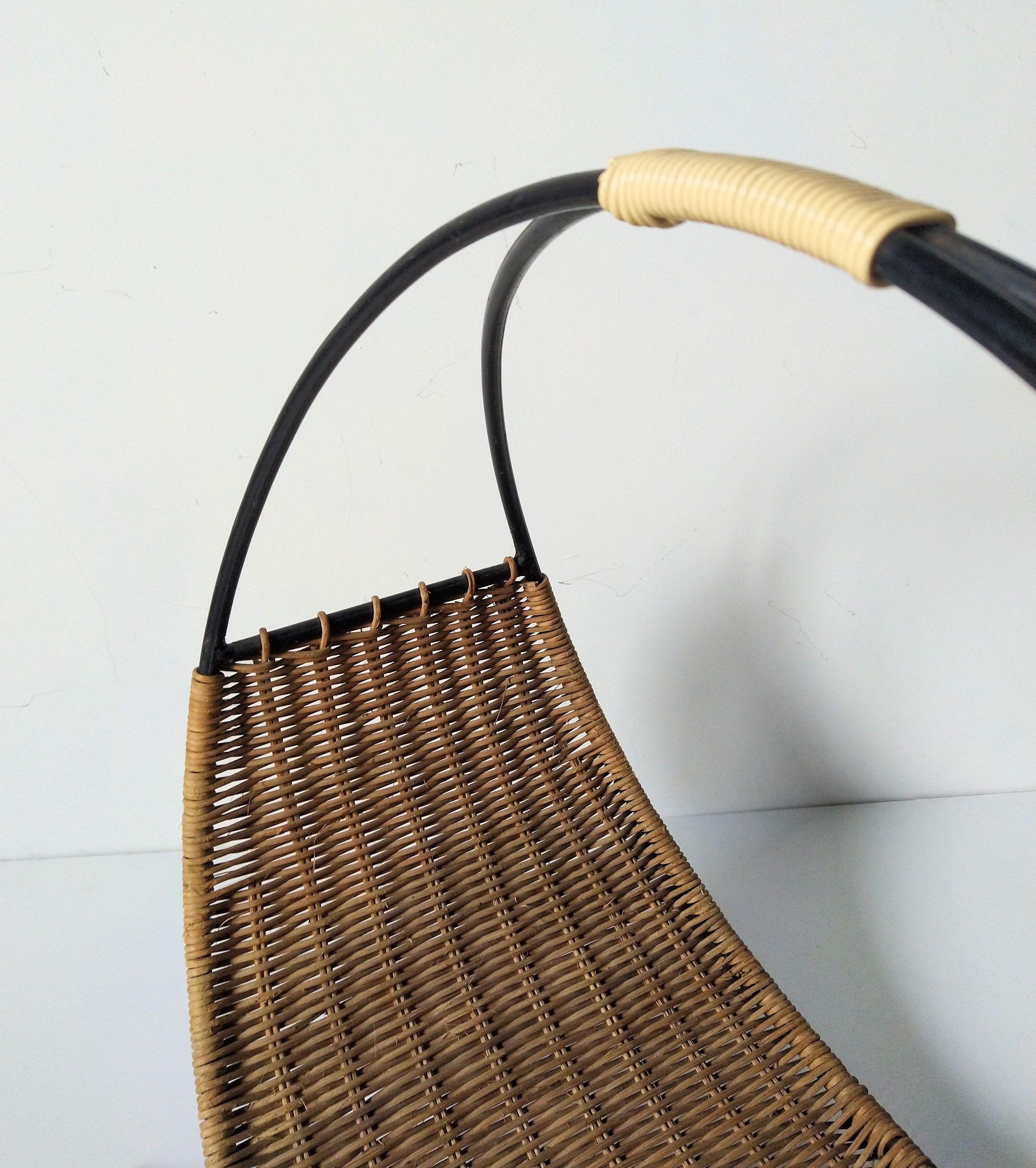 Rattan basket with logs