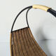 Rattan basket with logs