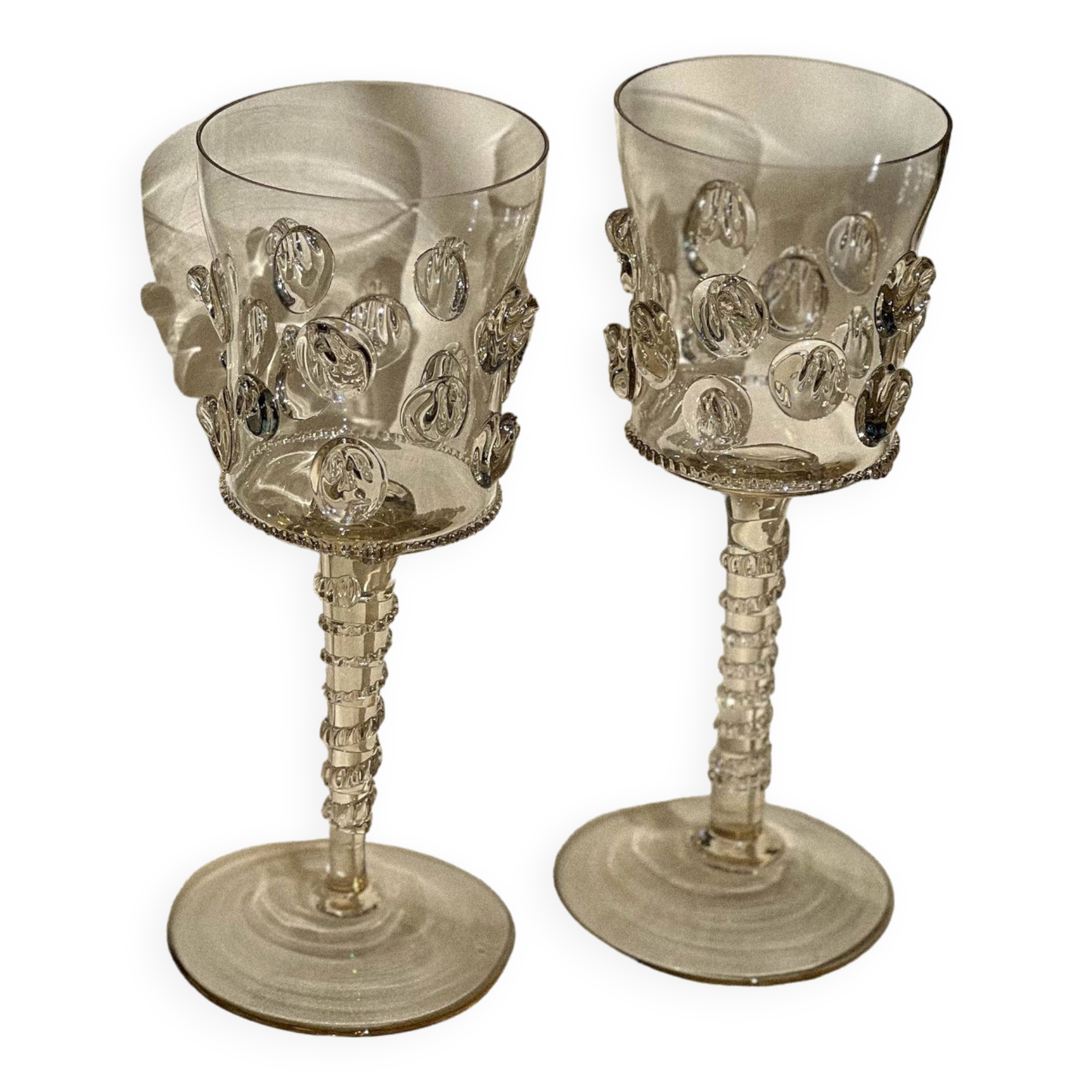 pair of blown wine glasses - green