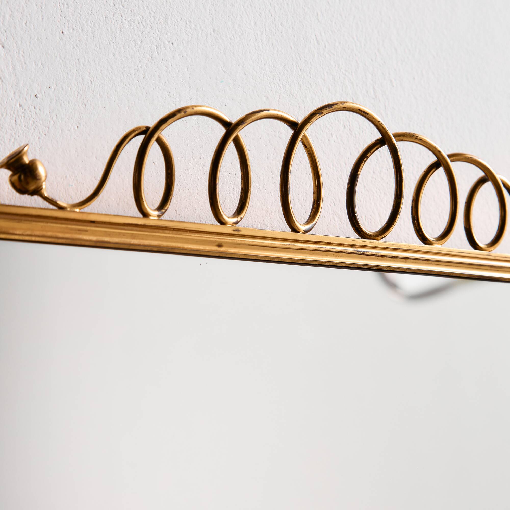 Metal and brass framed mirror