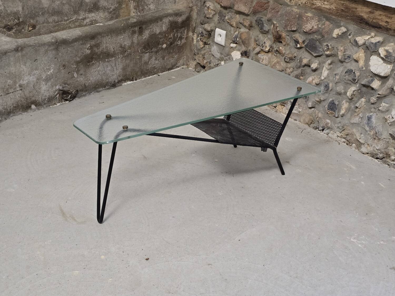 Coffee table in glass and black lacquered metal