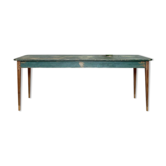 Vintage farm table with spindle legs.