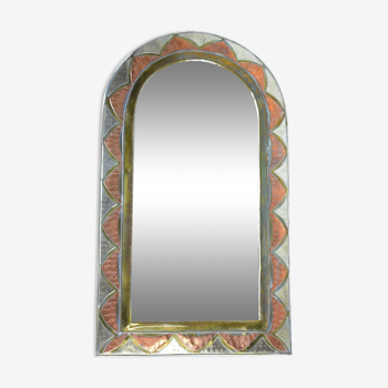 Decorated brass mirror.