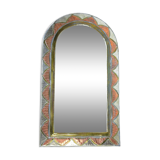 Decorated brass mirror.