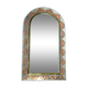 Decorated brass mirror.