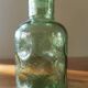 Paire de carafes en verre vert, années 70