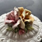Capodimonte-style porcelain lidded sugar bowl with floral relief