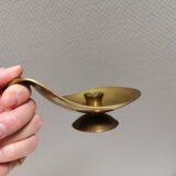 Brass candlestick for a single candle
