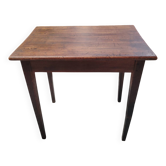 Small patinated solid wood side table with tapered legs - 1900