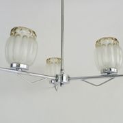 Vintage chandelier with 3 branches in chrome metal and glass globe. Year 70