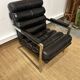 Vintage 1970s black leather armchair – metal frame