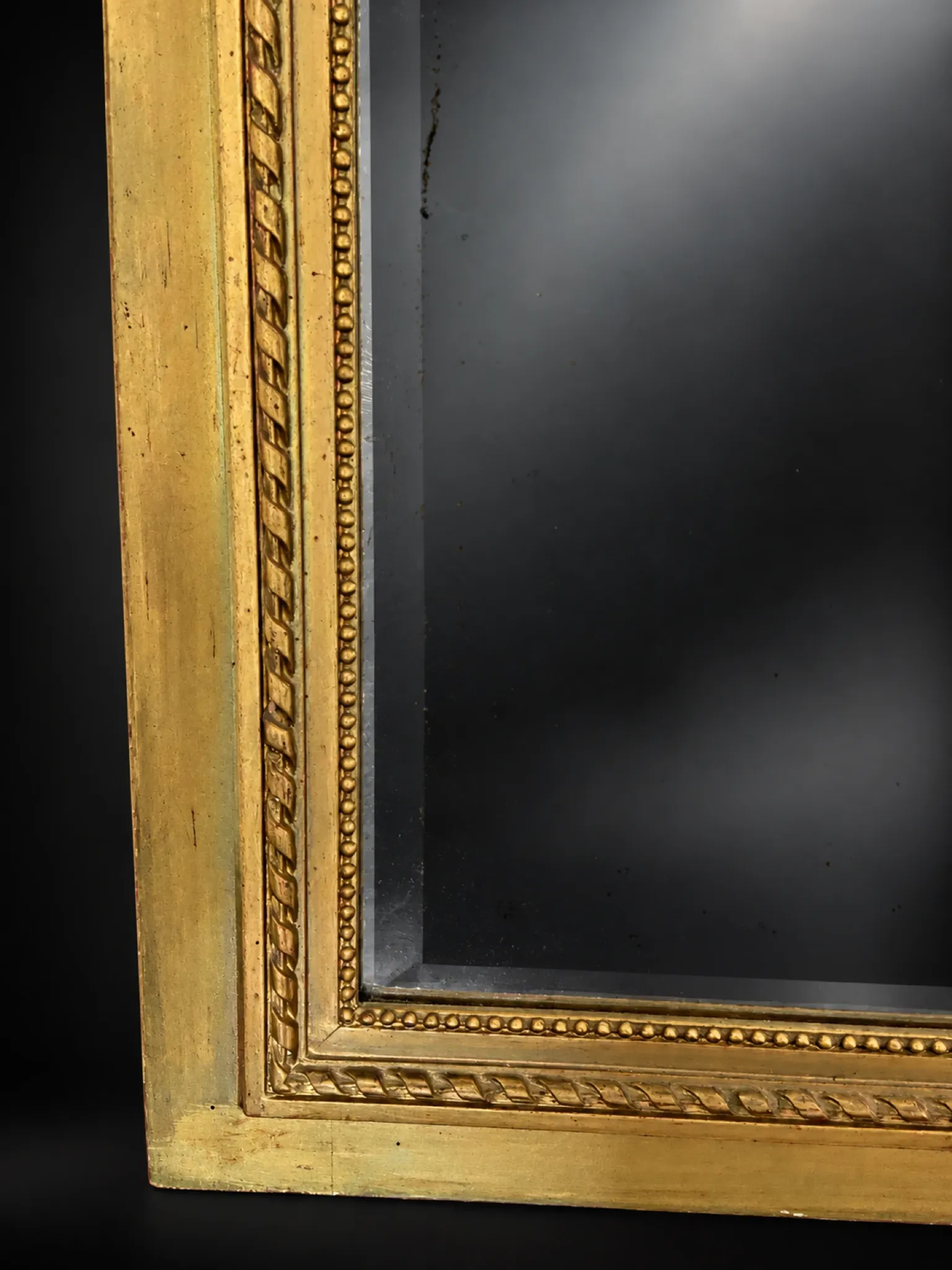 Golden trumeau mirror in Louis XVI style