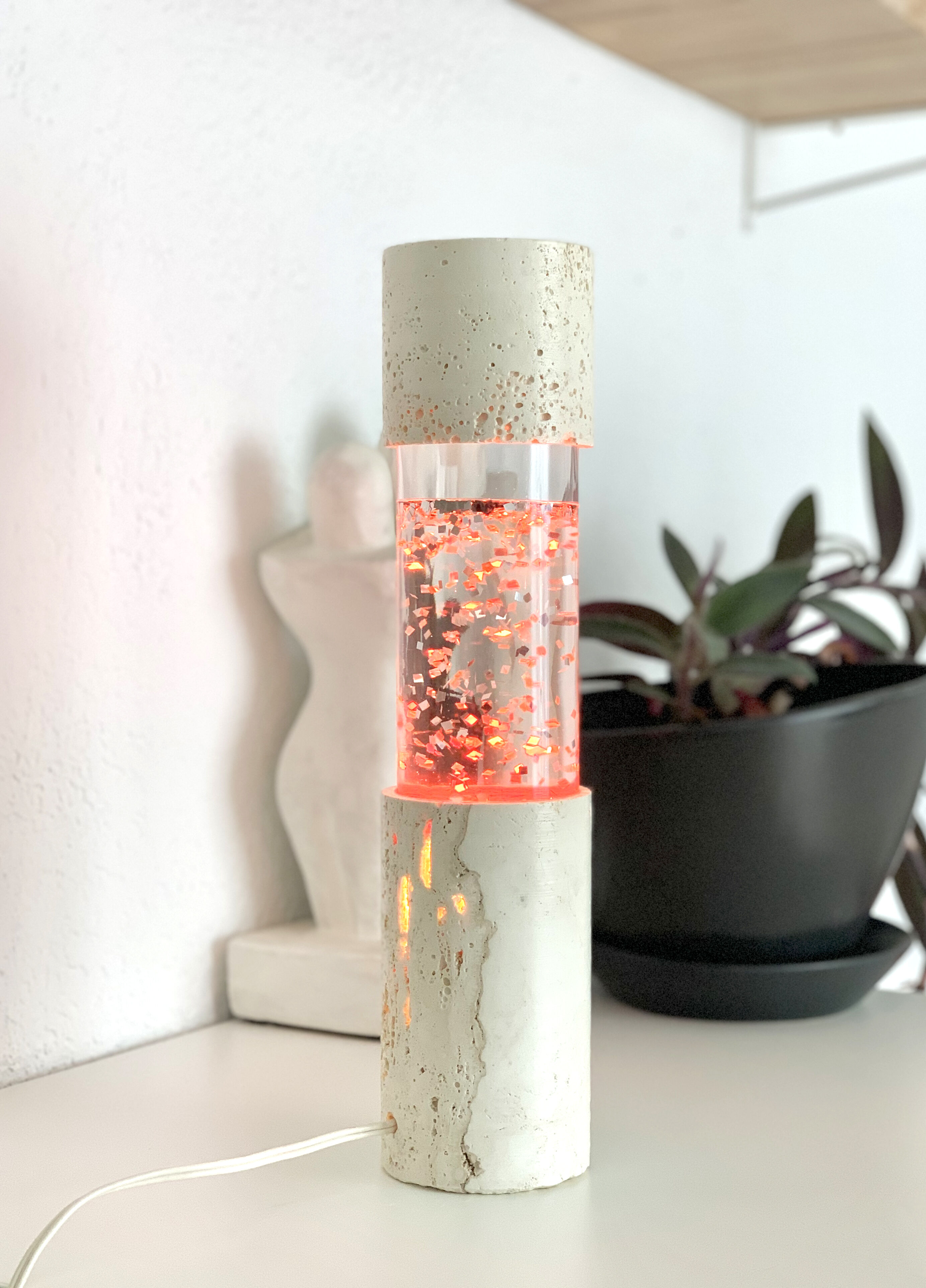 Vintage glitter lamp and travertine from the 70s.