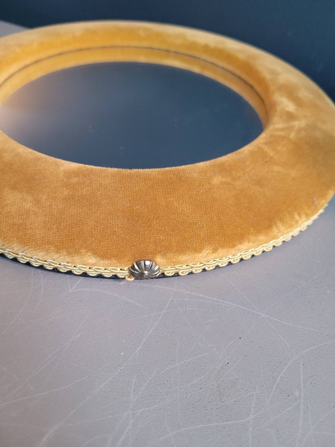 Vintage mirror with mustard velvet frame