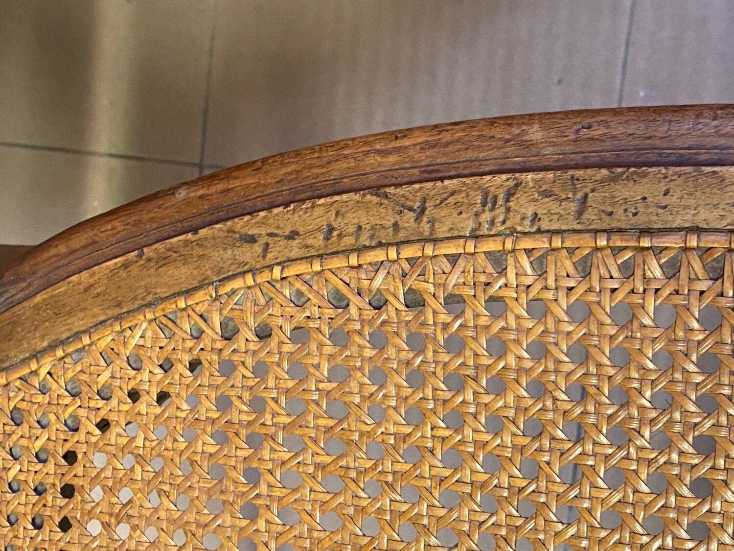 Chair with caned seat and back made of wood