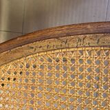 Chair with caned seat and back made of wood