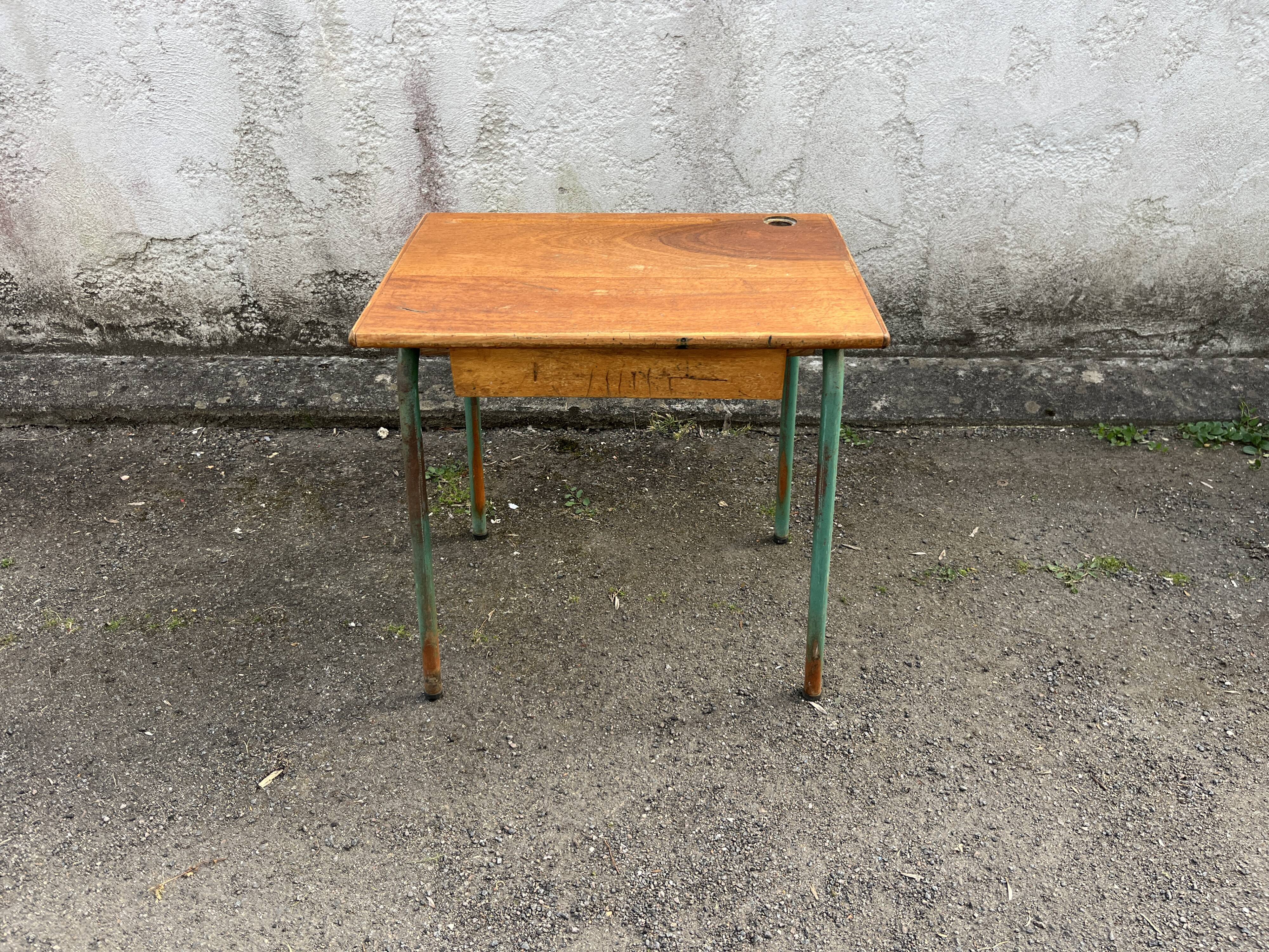 Vintage school desk made of wood and green metal - inkwell hole - antique.