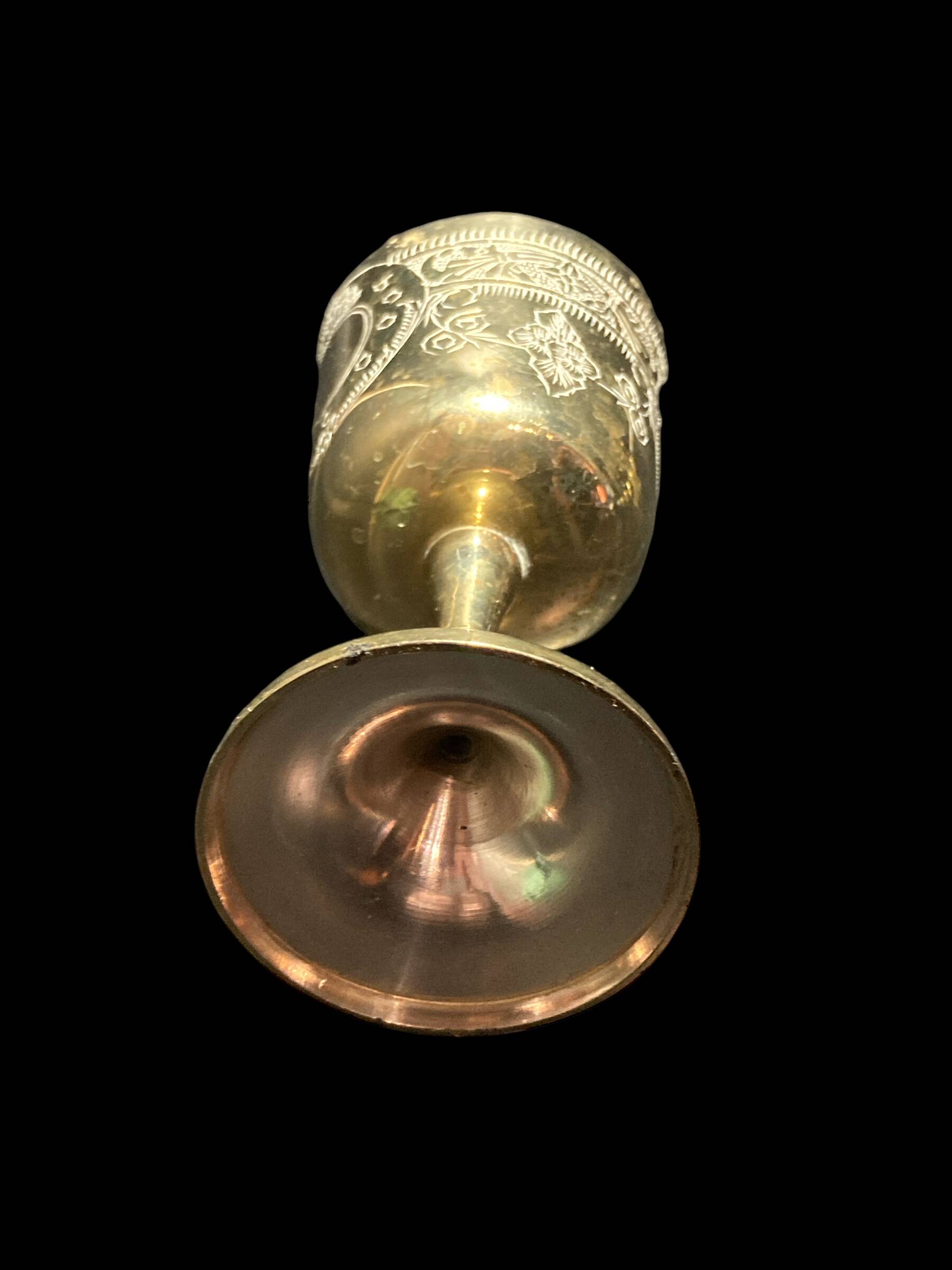 Set of six gold metal glasses