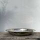 Round silver-plated metal serving dish with hallmark