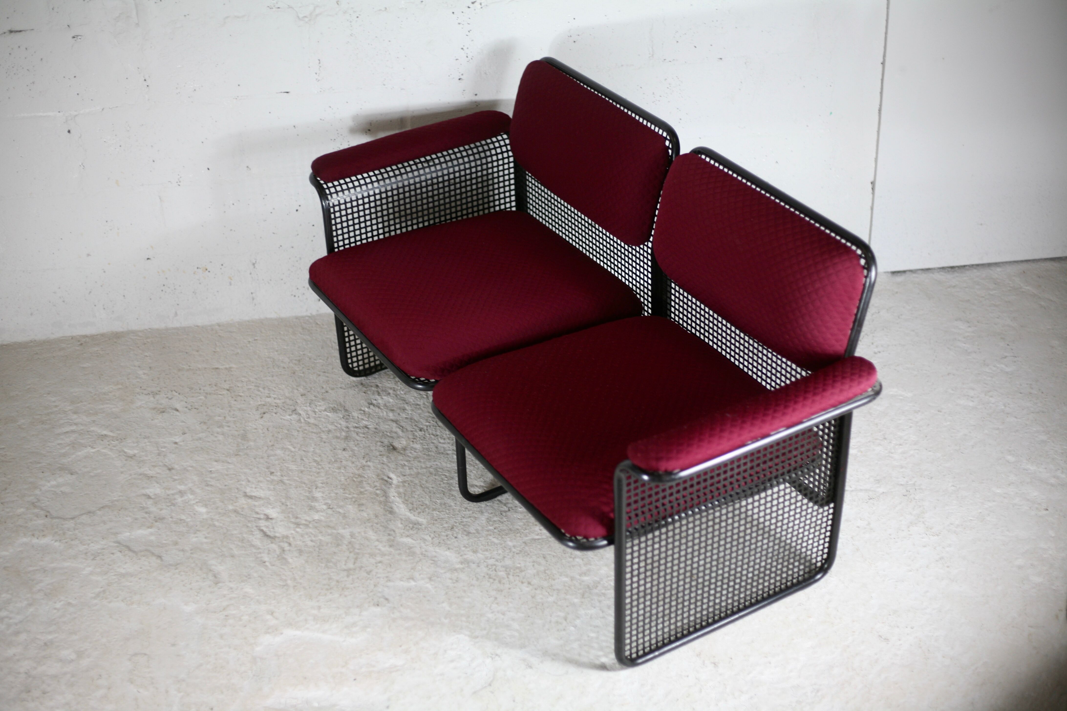 Black honeycomb steel sofa, burgundy fabrics, Italy, circa 1970