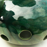 details on old bulb pot in glazed earthenware