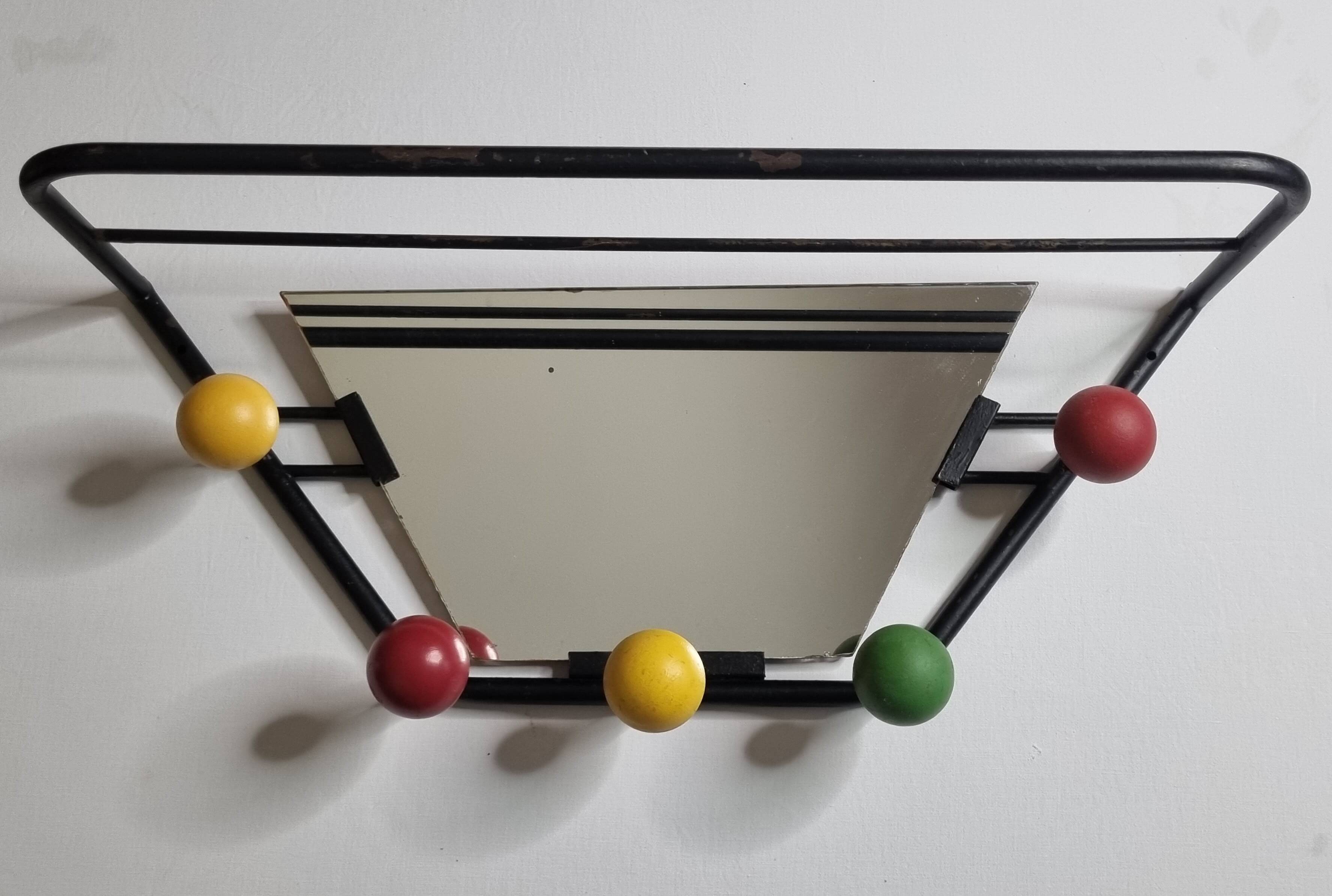 Wall-mounted coat rack with mirror, 5 hooks and hat holder from the 1950s-60s.