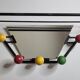 Wall-mounted coat rack with mirror, 5 hooks and hat holder from the 1950s-60s.