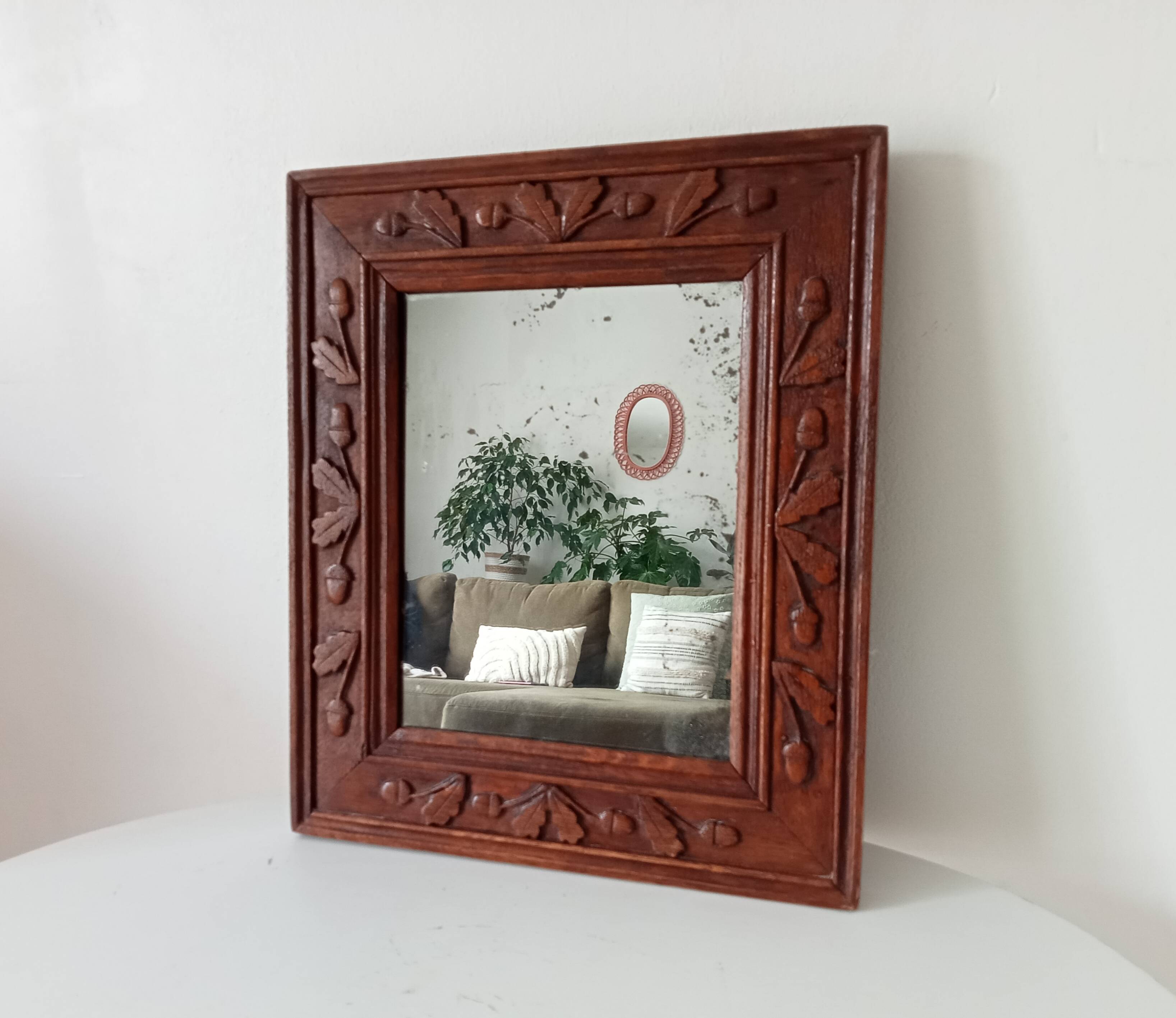 Antique mirror in carved wood
