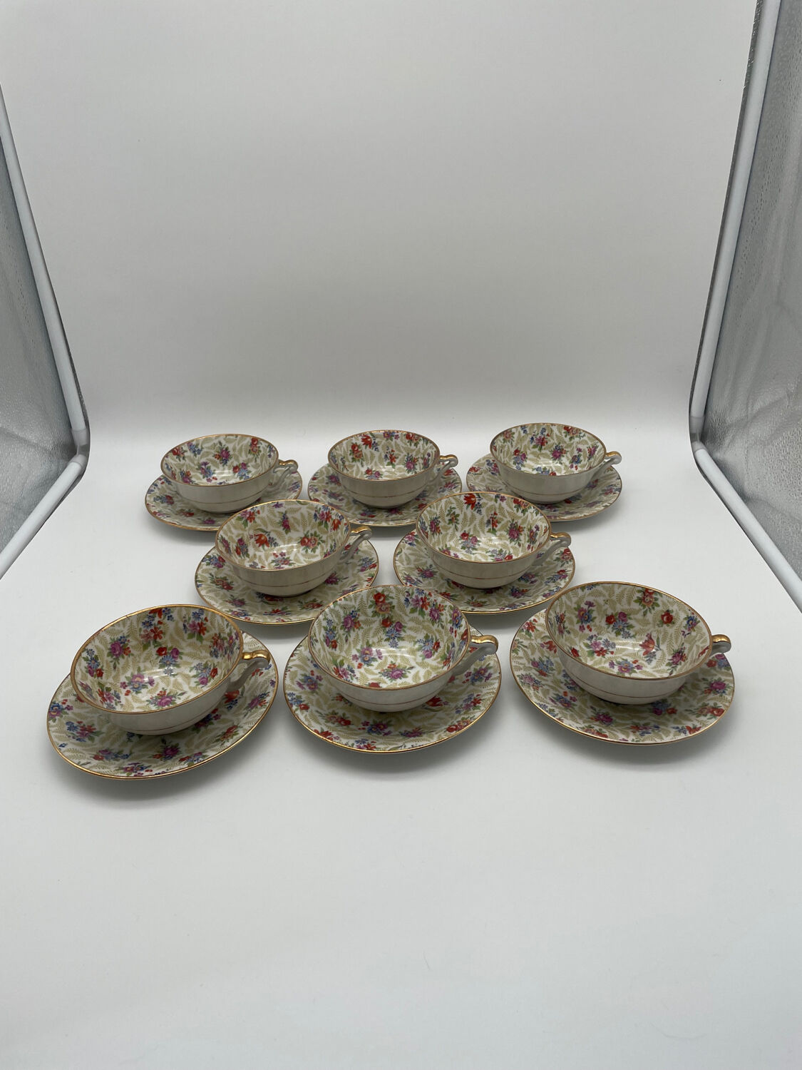 Set of 8 Limoges porcelain coffee cups from France with floral and gold pattern
