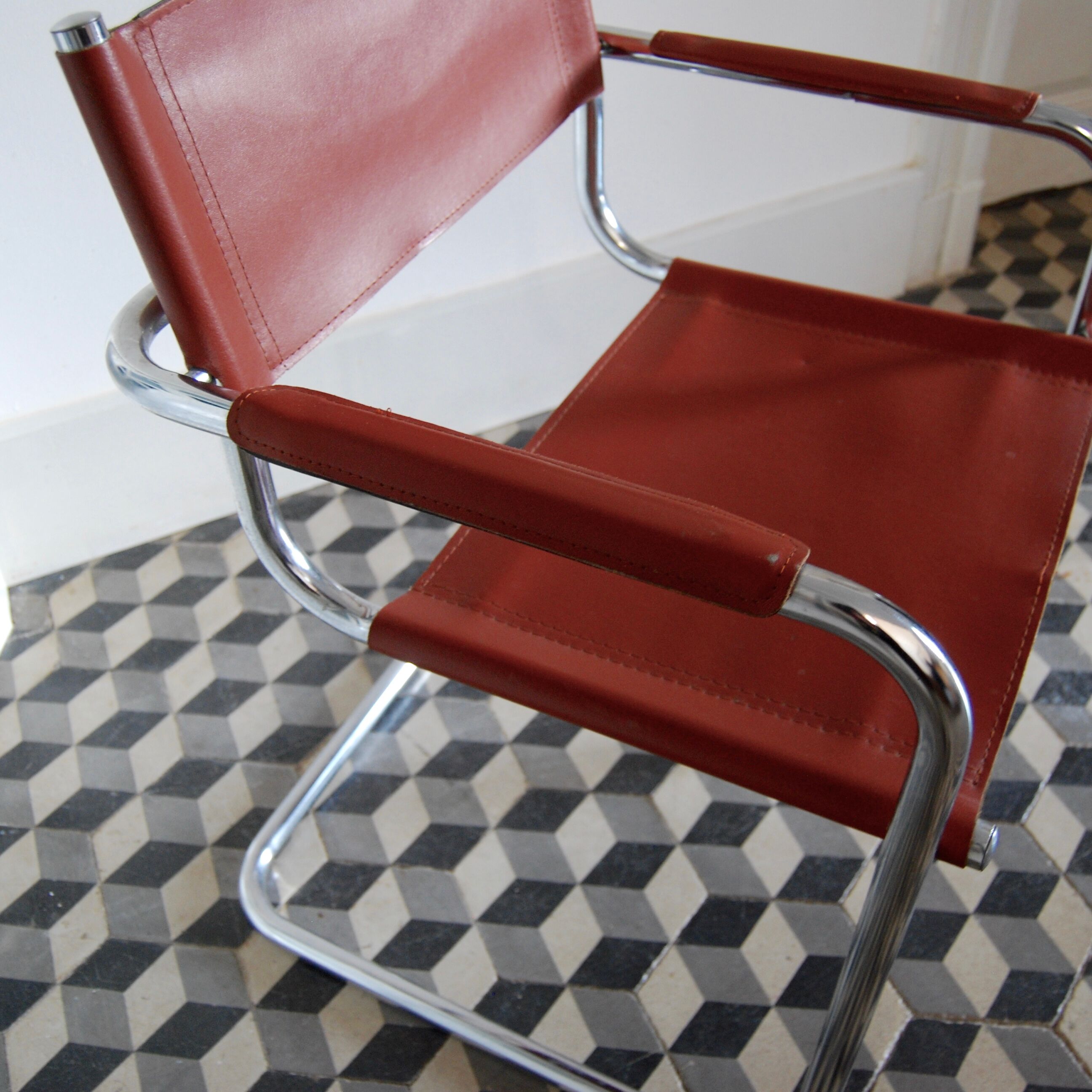 Vintage armchair in chrome and cognac leatherette