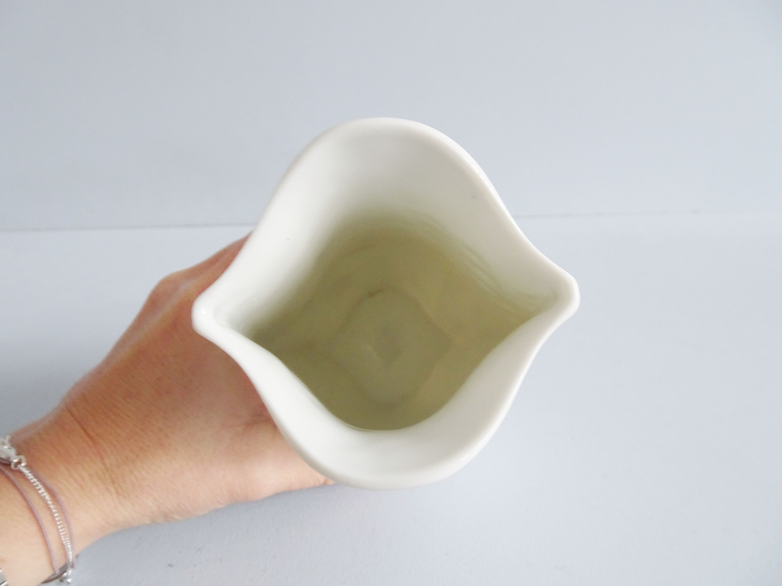 AK Kaiser bisque vase design M. Frey, white vase with flower relief