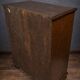 Ornamental piece of solid wood furniture, richly carved, dating from the 17th century.