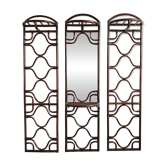 Bamboo coat rack in Mid Century Modern style with a 1970s mirror.