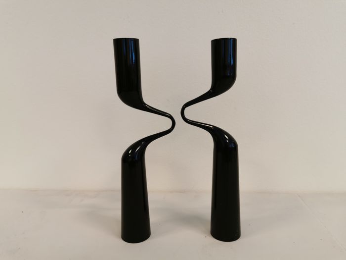 Set of two black design candlesticks, designed by mikaela dörfel for menu, denmark.