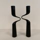 Set of two black design candlesticks, designed by mikaela dörfel for menu, denmark.