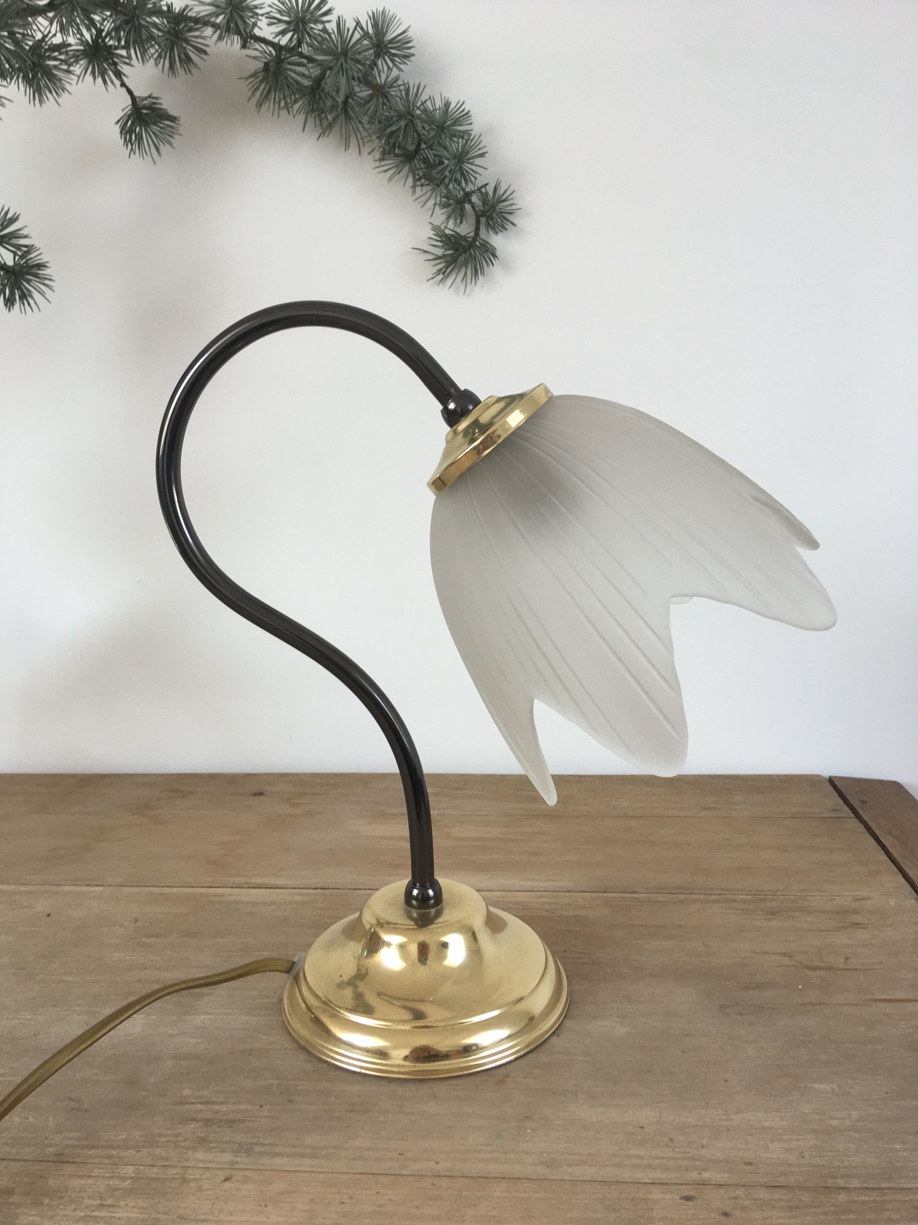 Table lamp with glass globe and brass foot