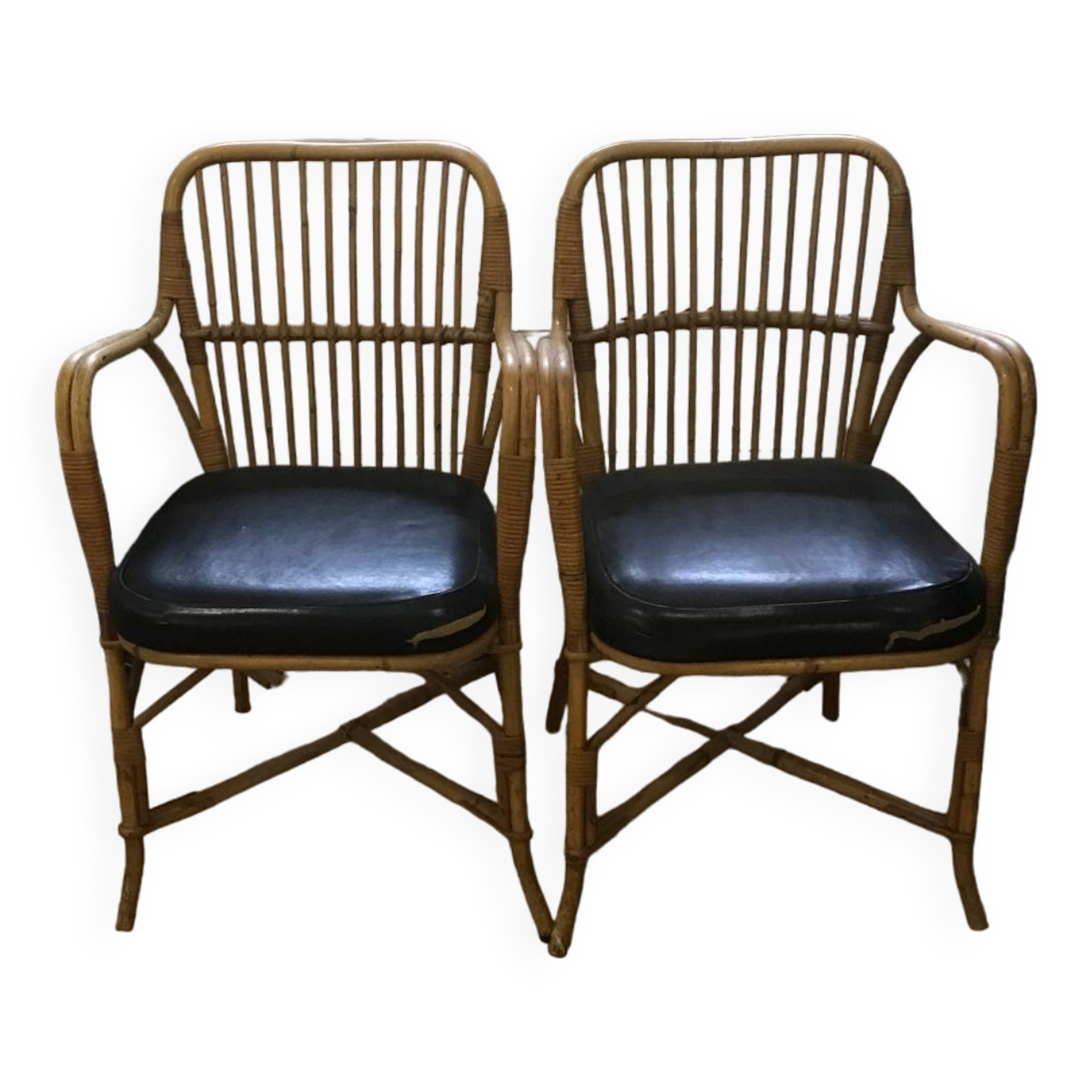 Pair of vintage rattan and leatherette armchairs