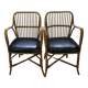 Pair of vintage rattan and leatherette armchairs