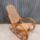 Rocking chair made of bent wood and rattan wicker.